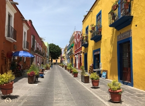 The brightly painted buildings of the Old Town in Pubela match the liveliness of the culture. (Photo by pianist Peijong Hsieh)